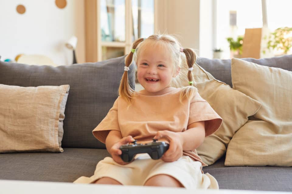 Girl with Down Syndrome Playing Videogames